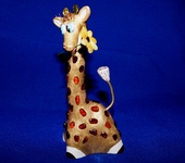 Жираф Мэлман с ромашкой. Керамический колокольчик.